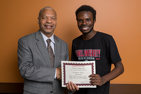 Jonathan Pierre with former Cornell Engineering Dean and Professor Lance Collins