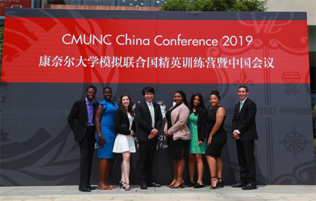 Jonathan Pierre with colleagues at conference in China