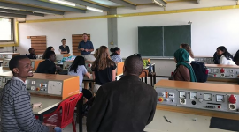 Meinig School Professors Schaffer and Nishimura in classroom in Tanzania