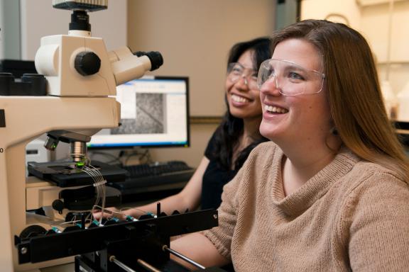 Professor Susan Daniel shares a laugh in the lab with a student