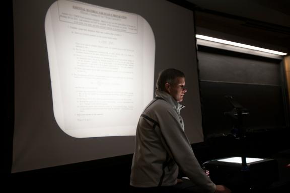 Lecturer using an overhead projector during a class