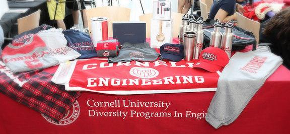 Table display of Cornell University, Cornell Engineering, and DPE branded items