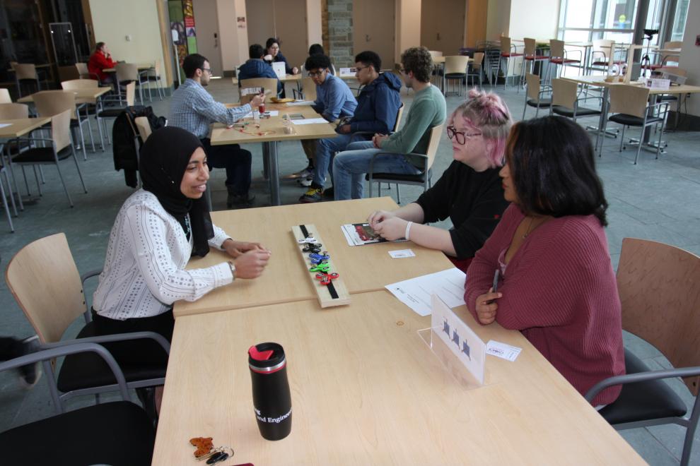 Assistant Professor El-Ghazaly works with visiting students